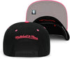 Mitchell & Ness Black/Pink NBA Charlotte Hornets Santa Ana 2-Tone Snapback - OSFA